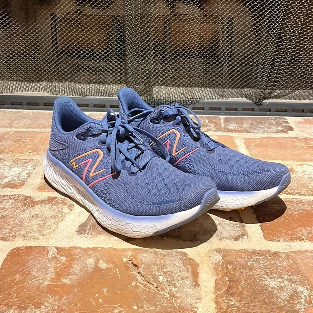 New Balance Women's Blue Athletic Sneakers with Pink Accents